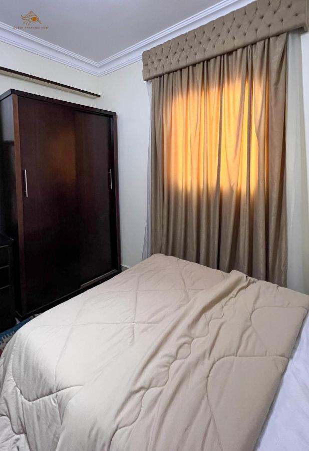 Queen Pyramids View Apartment Il Il Cairo Esterno foto