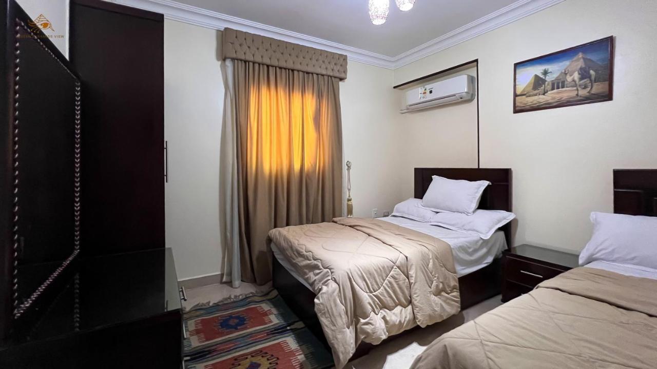 Queen Pyramids View Apartment Il Il Cairo Esterno foto